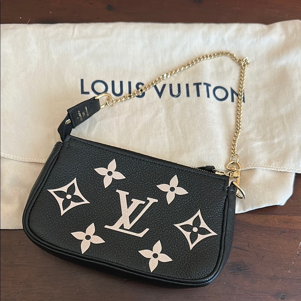 Louis Vuitton Black and Gold Clutch with Metallic Accents